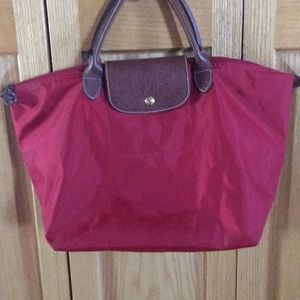 Red Longchamp purse.